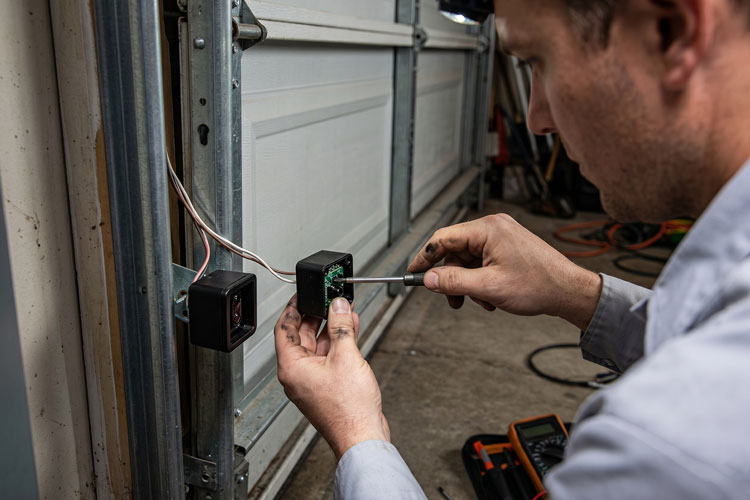 Garage door sensor repair