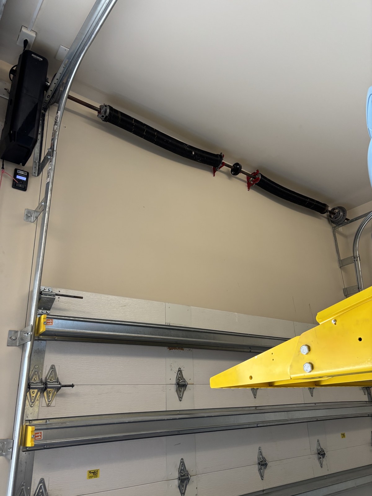 Garage door opener and spring service in Palm Springs FL
