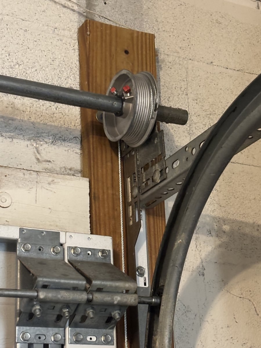 Garage door cable drum serviced on the torsion shaft in Deerfield Beach, FL