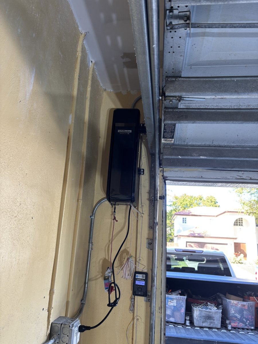 Wall-mount jackshaft garage door opener installed
