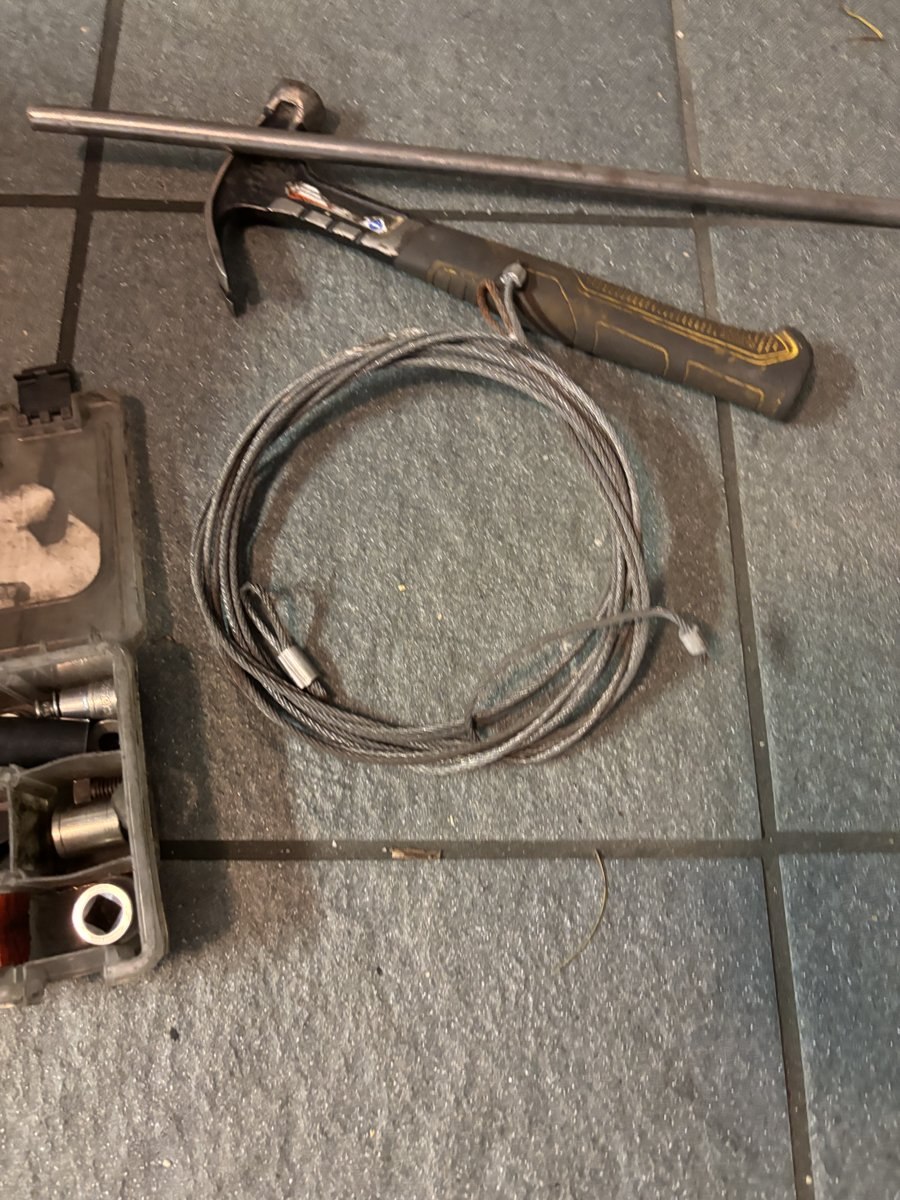 Technician tools staged on site during a South Florida garage door repair