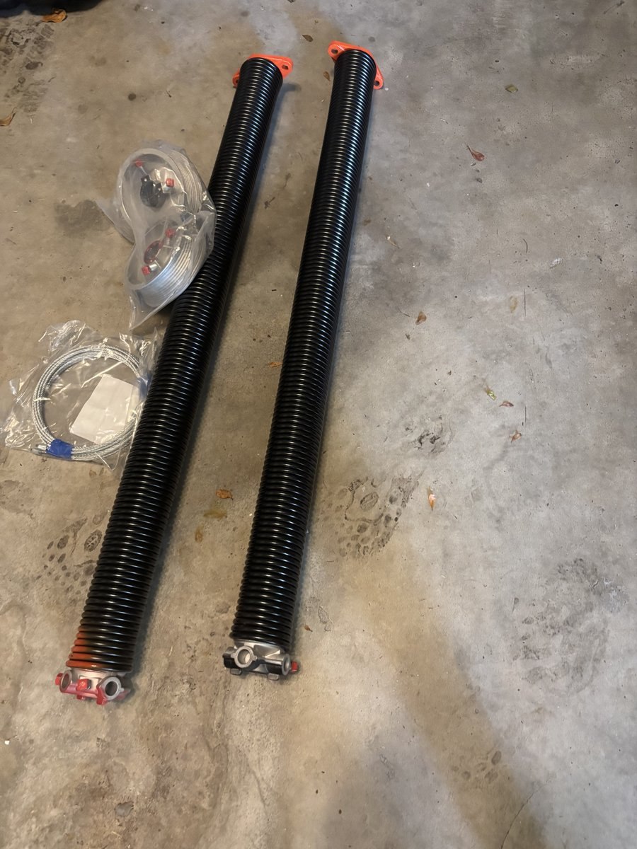 New torsion springs ready for installation on a Boca Raton, FL garage door
